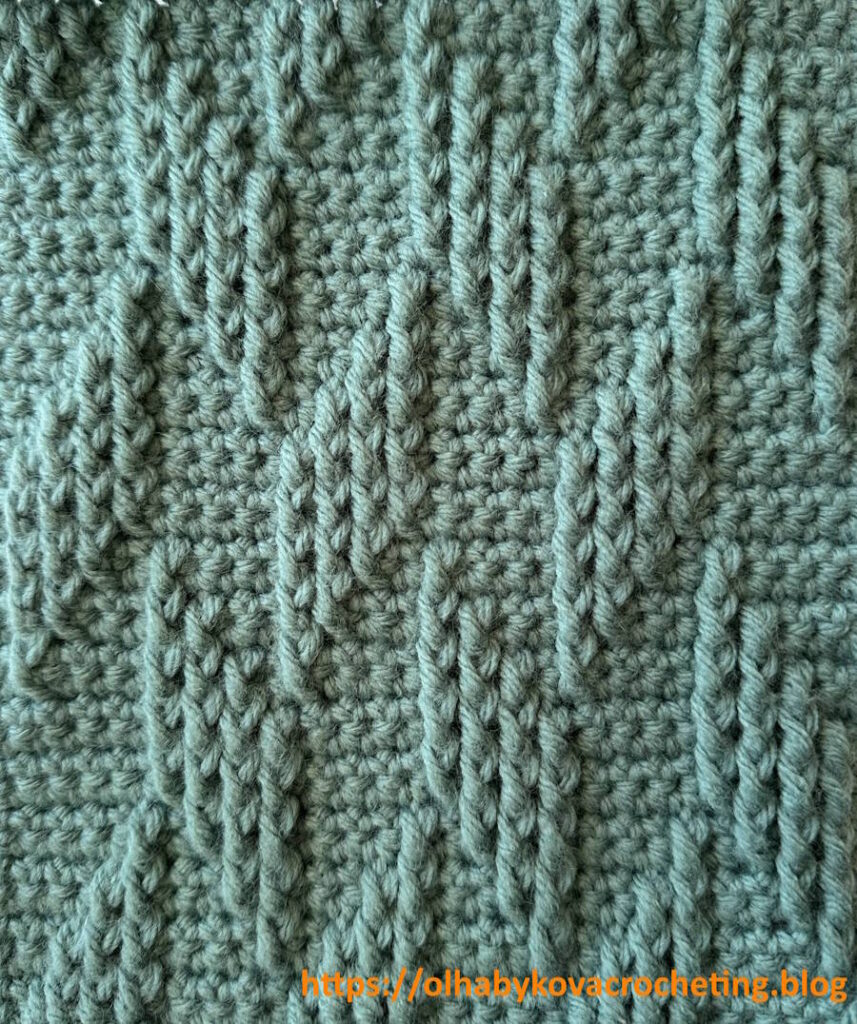 Shadow Diamond crochet stitch texture showing raised geometric diamond pattern with a subtle shadow effect in solid color yarn