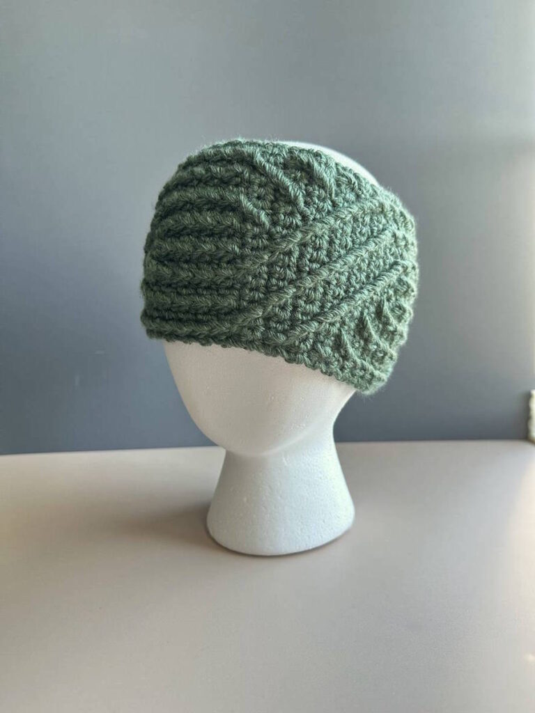 Crochet aran headband worn – spiral cable ear warmer for women