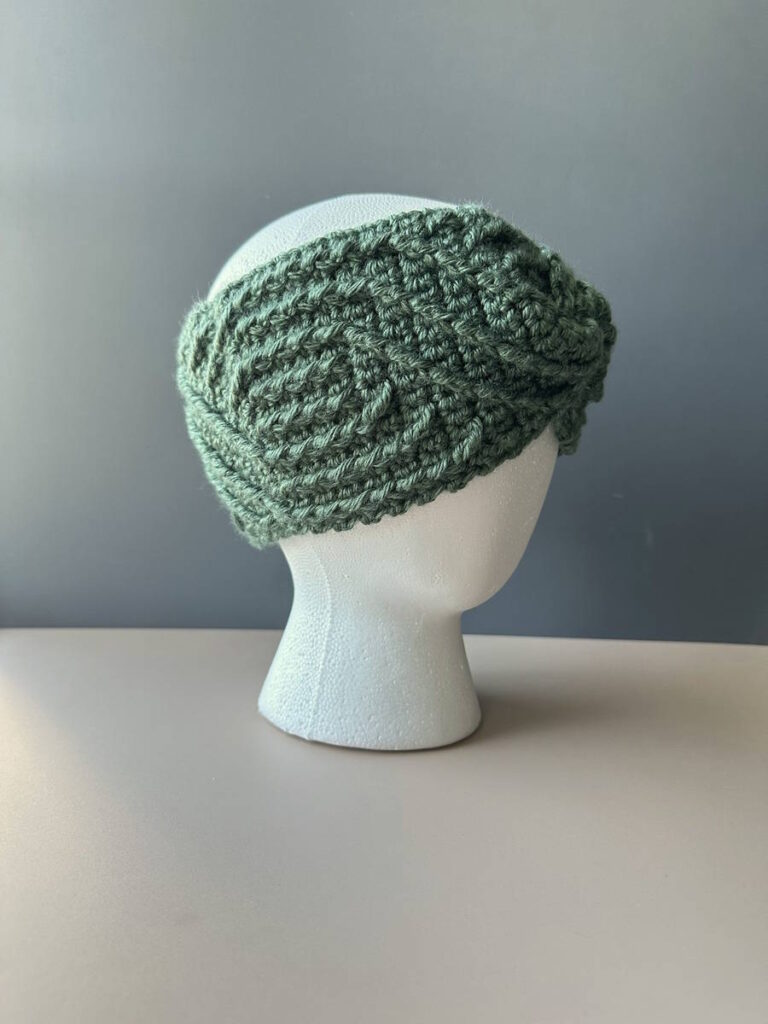 Winter crochet ear warmer with aran cable texture – spiral headband