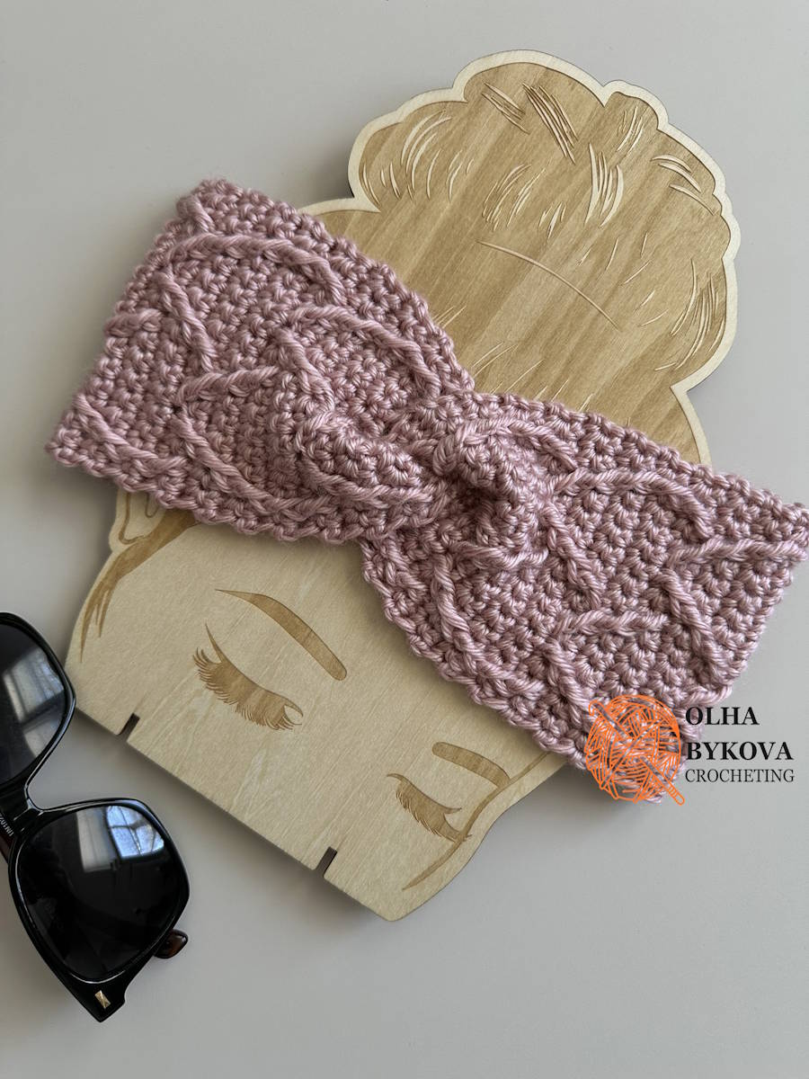 Elegant Hearts crochet headband with twisted front finish highlighting heart texture.