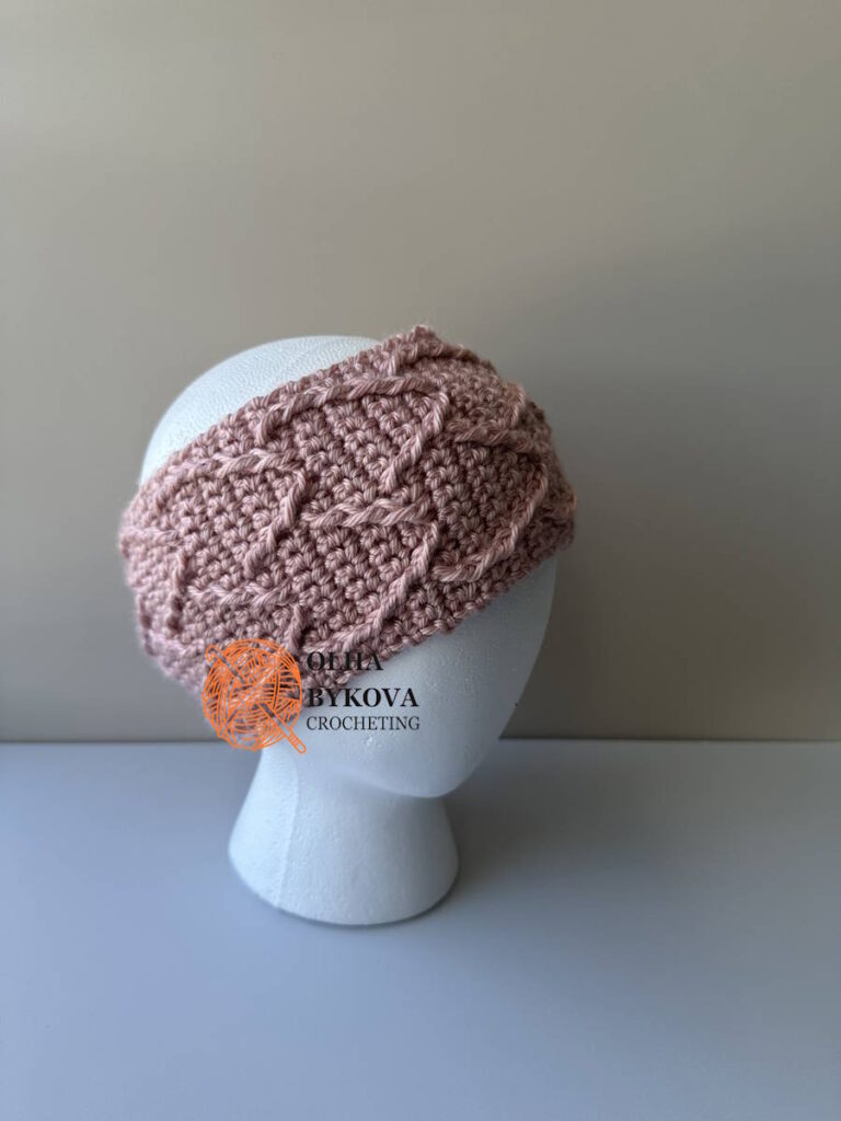 Angled view of Elegant Hearts textured crochet headband styled for everyday wear.