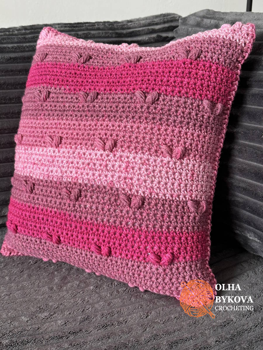 Finished textured crochet pillow case with heart stitches, perfect for Valentine’s Day home decor and handmade gifts.