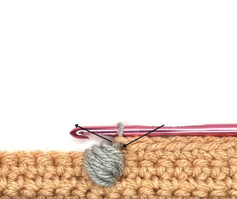 Insert the hook around the narrow vertical part of the stitch just below the top loops when working a return one Front Post Puff Stitch