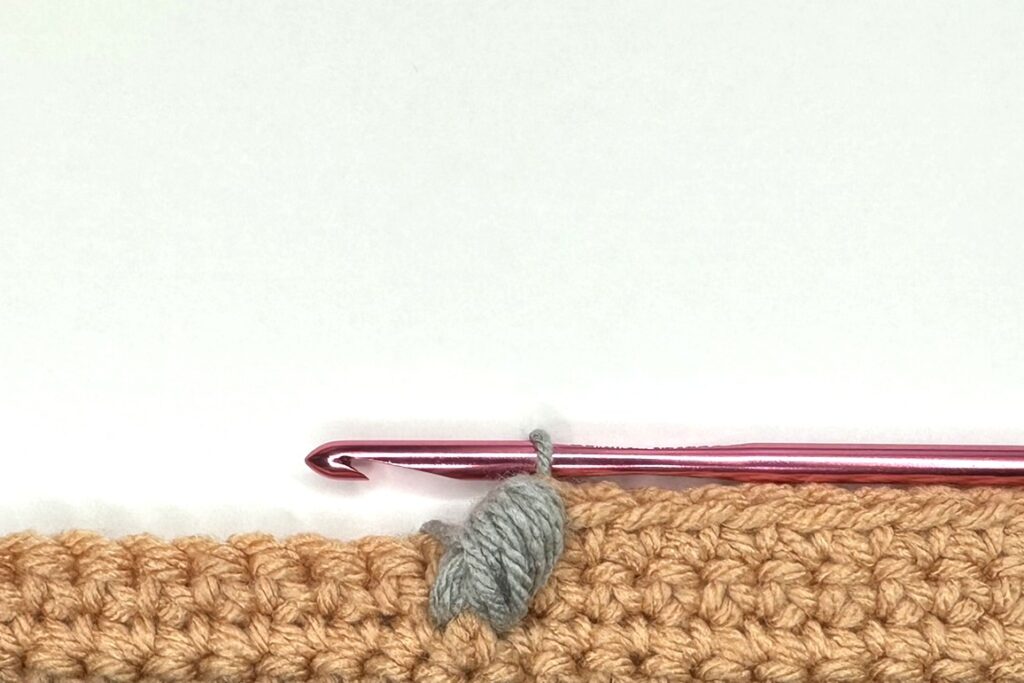 Finished Skip 1 Front Post Puff Stitch showing the completed texture and stitch placement in crochet