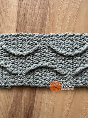 Close-up of textured crochet ripple stitches, ripples cup cozy pattern with soft cable-inspired texture Preview