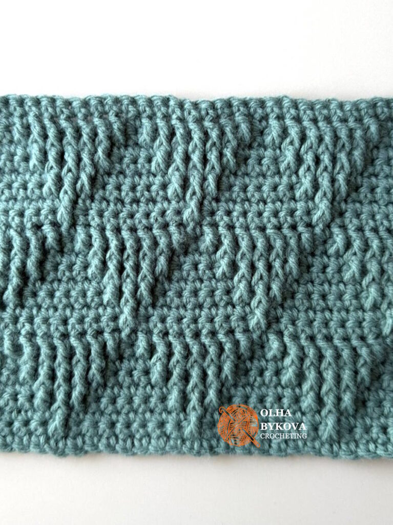 Close-up of the Shadow Basket Weave Triangle Crochet Stitch Pattern showing a textured basket weave crochet stitch with geometric triangle motifs and raised front post stitches.