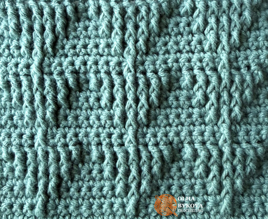 Close-up of the Shadow Stacked Triangle Crochet Stitch Pattern showing crochet stitches texture, raised front post stitches, and strong shadow effects between rows.