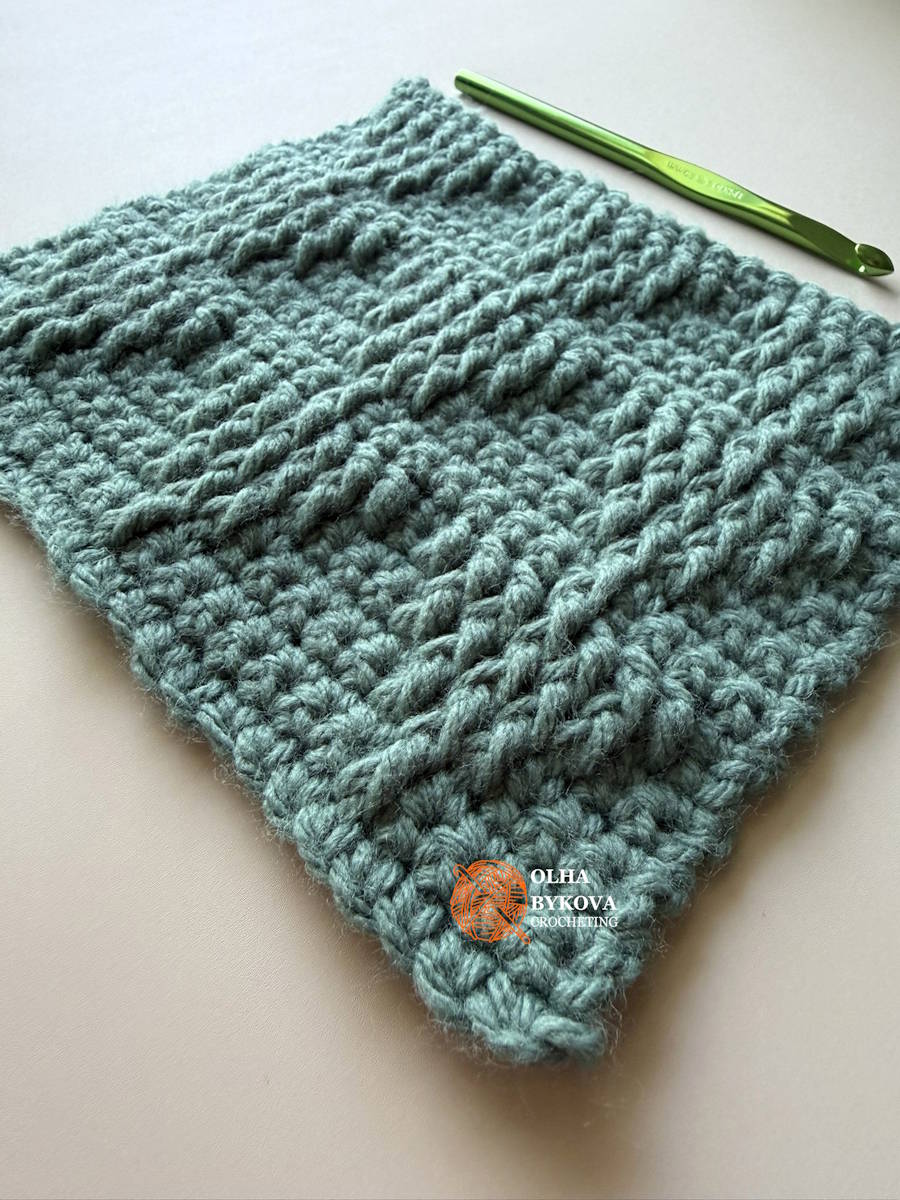 Shadow Stacked Triangle Crochet Stitch Pattern viewed from an angle to highlight dimensional texture, shadows, and raised stitches in this crochet texture stitch