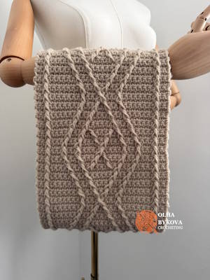 Diamond Frame crochet cable cowl folded to show the repeating geometric cable stitch pattern preview