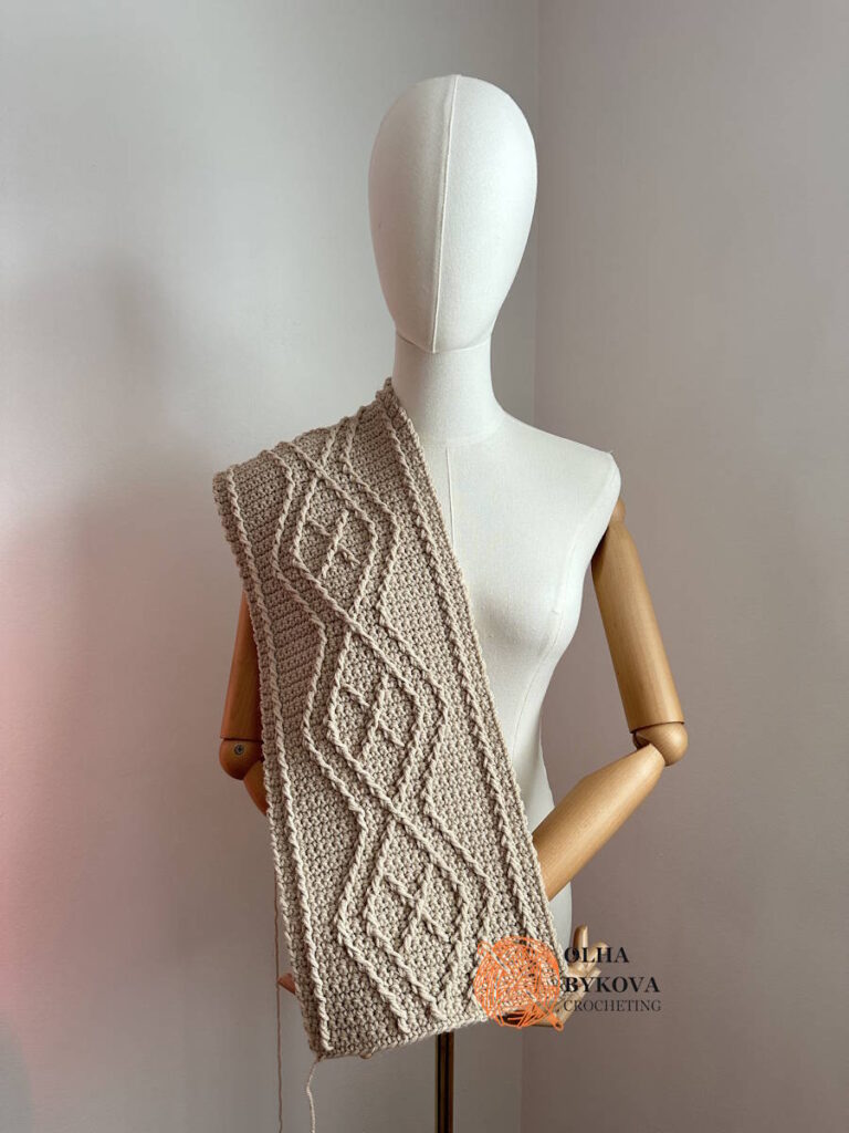 Diamond Frame Crochet Cable Stitch displayed as a crochet scarf sample, showing an elegant textured crochet cable stitch.
